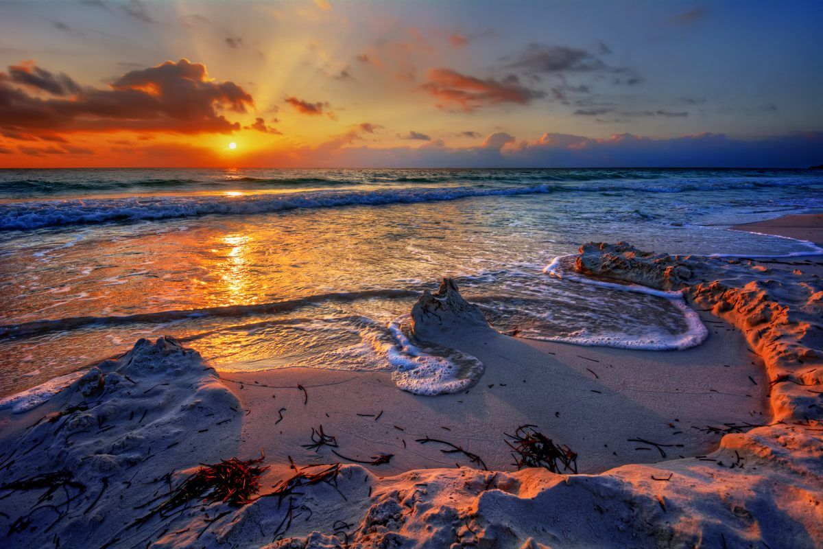 sunset on the shore in panama city beach