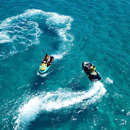 Aerial view of two jet skiers in the water