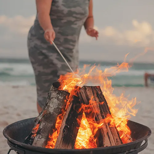 Roasting marshmallows over a bonfire